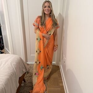 Elegant Orange and Cream Saree